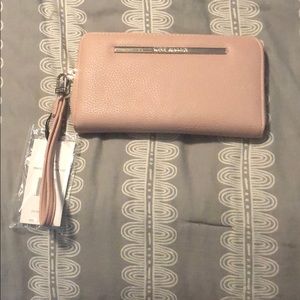 Steve madden blush clutch.